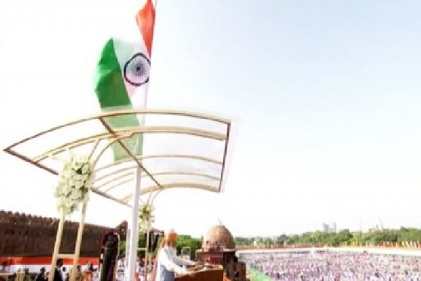 pm modi unfurls tricolour at red fort as india celebrates 75th i-day