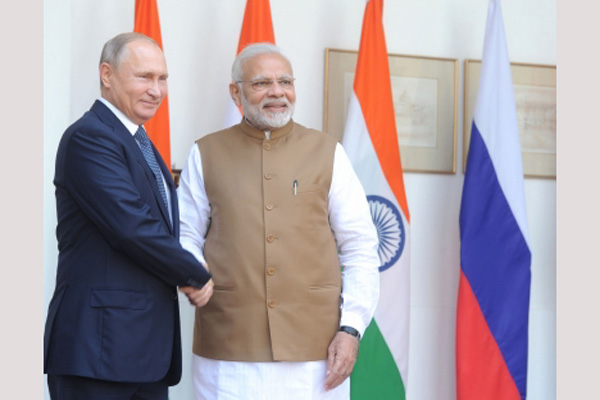 russian president vladimir putin lauds pm modi as great friend of russia and praises make in india initiative