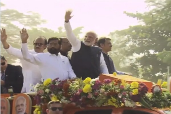 sea of saffron as pm modi holds mega roadshow in nashik