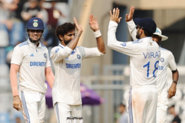 jadeja sundar spin magic holds new zealand to 235---