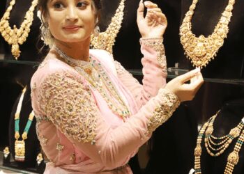 Gold, Silver prices ease on MCX amid profit booking at record highs