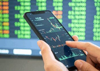 Sensex, Nifty end higher after hitting record levels