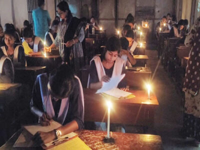 Students Write Board Exams in Candlelight After Power Outage in Kumarghat
