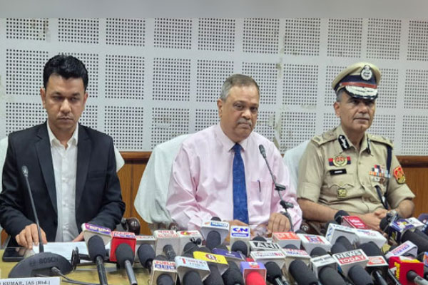 State Election Commissioner Manoj Kumar addressing a press conference in Agartala regarding the 2026 TTAADC election schedule and Model Code of Conduct.