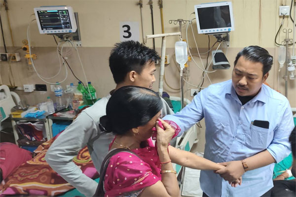 BJP State Secretary Bipin Debbarma consoles a crying woman at GBP Hospital Agartala while checking on injured party workers from Khowai after a post-poll clash