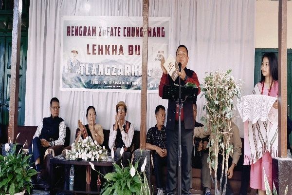 Pu JD Mawia addressing audience a podium in Vanghmun while launching his new book 'Rengram Zofate Chungchang'