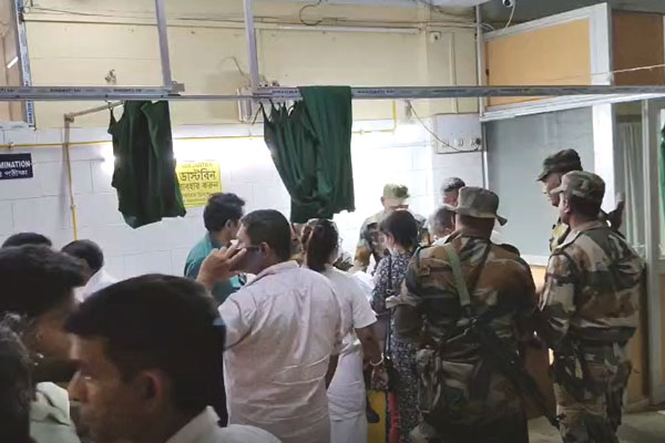 Injured TSR jawans and police personnel receiving treatment at a hospital in Tripura following poll-related violence in Kamalpur.