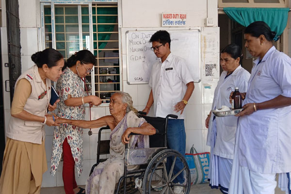 Elderly woman receiving medical attention at Kalyanpur hospital after alleged abuse by her son in Tripura