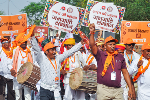 A section Participants at Delhi's Tribal Conclave where Amit Shah UCC exemption for Tribal communities and Govt's initiatives for tribal welfare.