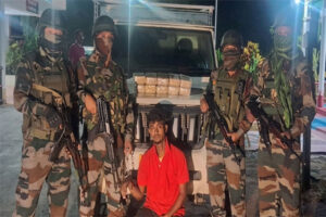 Assam Rifles personnel with seized Yaba tablets and arrested suspect during anti-drug operation in Tripura