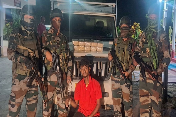 Assam Rifles personnel with seized Yaba tablets and arrested suspect during anti-drug operation in Tripura