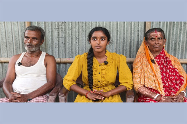 Farmer's daughter, Baby Pal with her parents at their home in Ragna village under the North Tripura District after scoring 94% in CBSE Class 12 examinations”