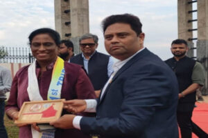 Tripura Olympic Association Secretary Sujit Roy presented memento to IOA president P.T. Usha during the 39th National Games meeting at Meghalaya 