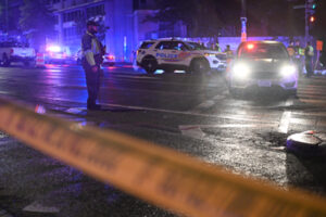 Secret Service and police vehicles secure area after White House shooting incident in Washington DC in which the suspected gunman was killed.