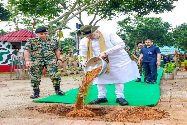 Union Home Minister Amit Shah planting saplings at BSF Lankamura Border Outpost in Agartala during World Environment Day celebration